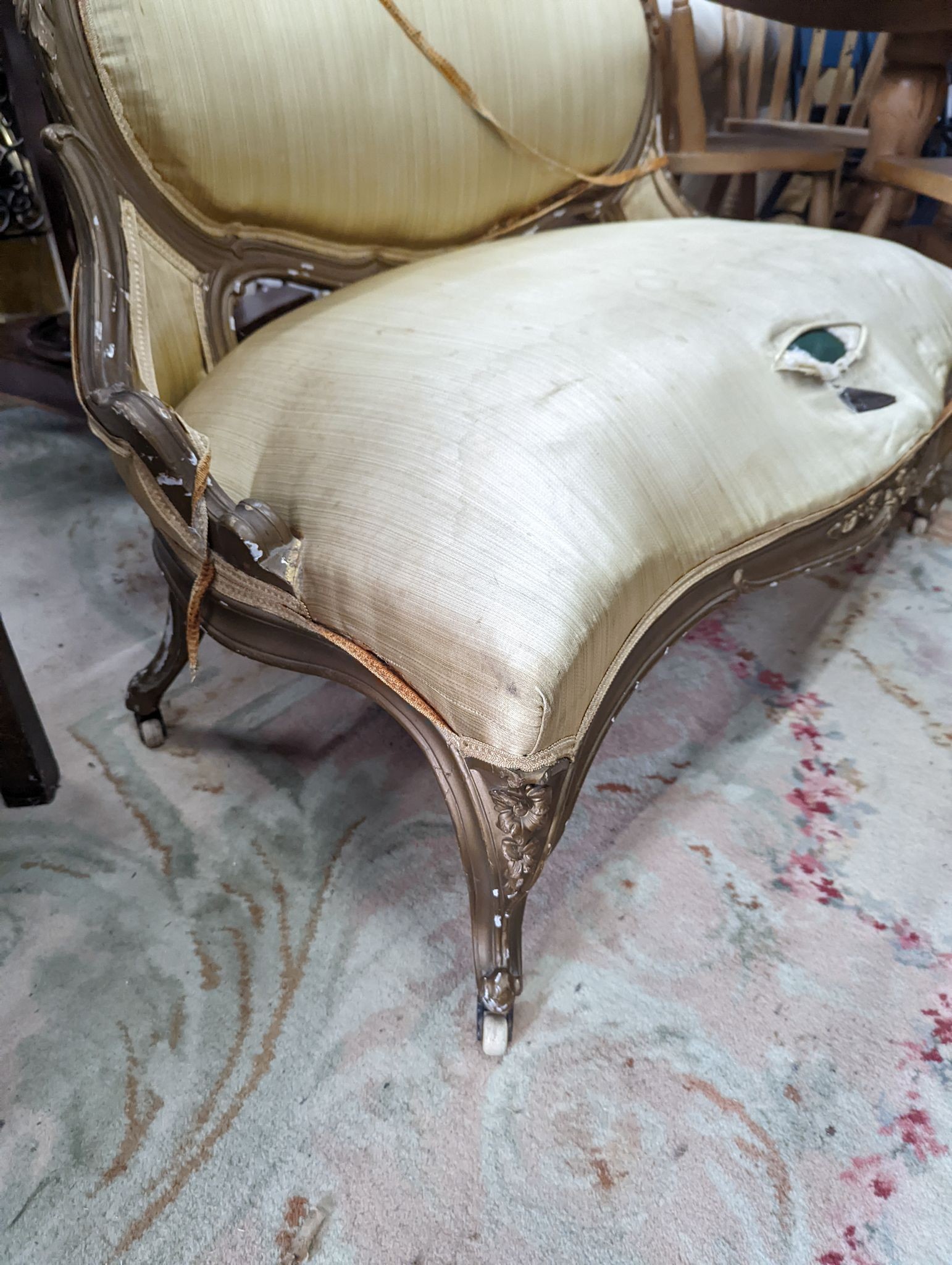 A 19th century giltwood and gesso French canape, length 120cm, depth 56cm, height 84cm